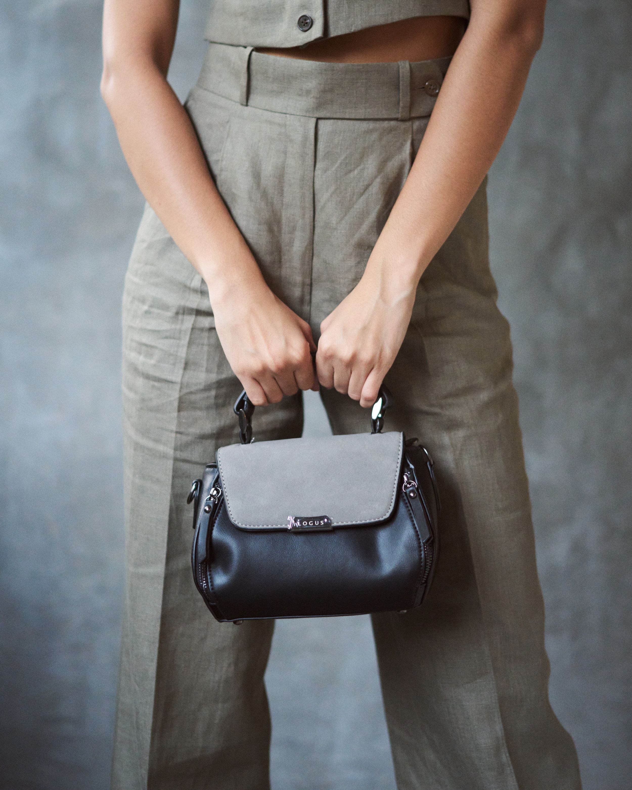 Logus top handle black sling bag