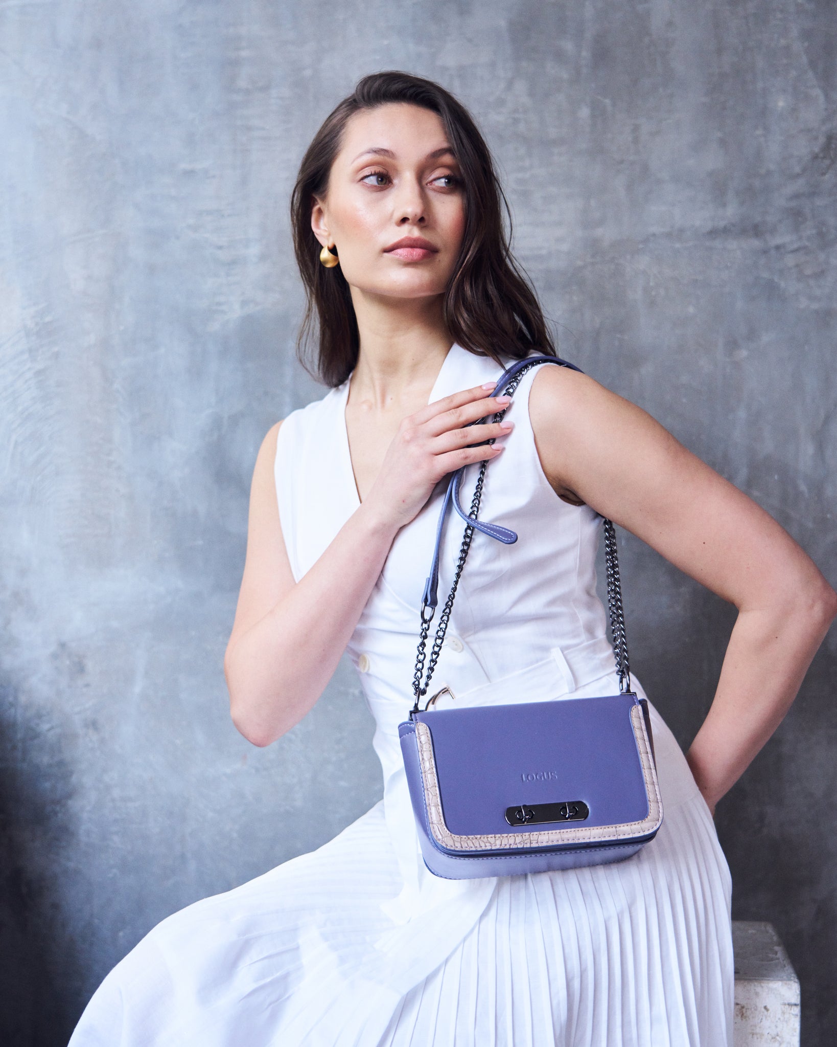 Logus structured sling bag
