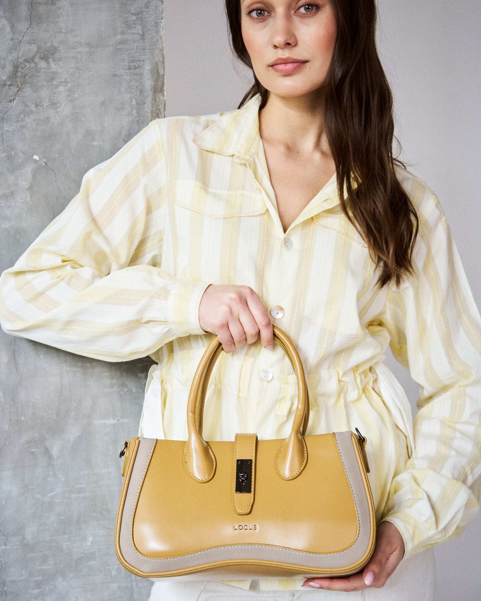 Logus mustard structured handheld bag